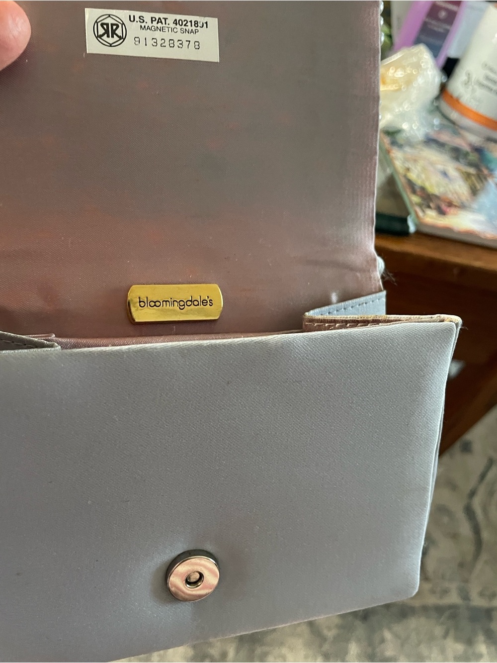 Bloomingdale's Silver-Gray Satin Clutch with Gold Logo Plaque